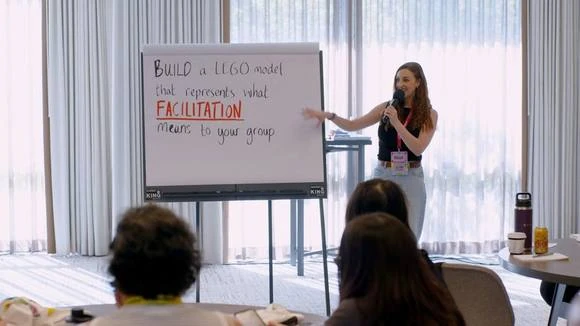 Rebecca facilitating a live workshop