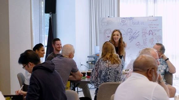 Rebecca facilitating a live workshop