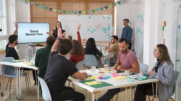 Rebecca facilitating a live workshop