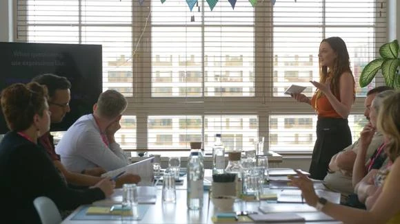 Rebecca facilitating a live workshop